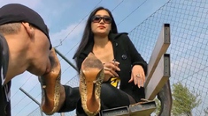 Light femdom and foot fetish play with brunette