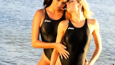 Blonde And Brunette Lesbians Stripping And Making Out