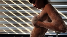 Hot babe with perfect big boobs taking shower